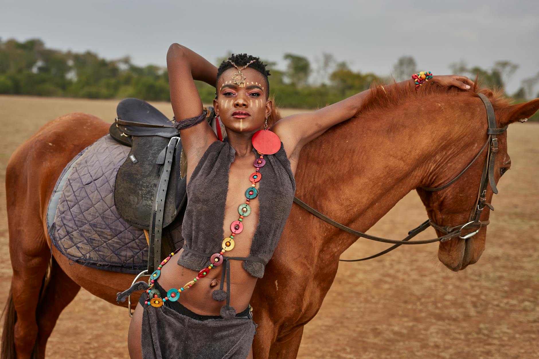sexy woman leaning on a horse